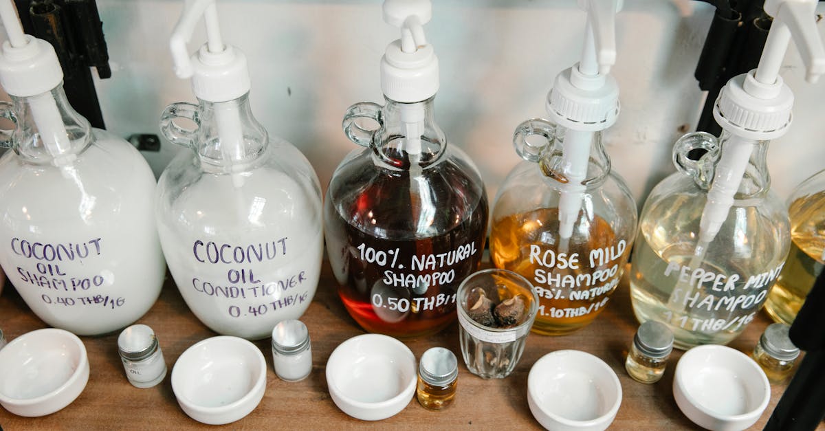 Eco-friendly shampoos and conditioners on a shelf, showcasing natural and coconut oil products.